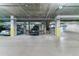 Secured underground parking featuring assigned parking spaces and easy access to elevators and exits at 5455 Landmark Pl # 1414, Greenwood Village, CO 80111