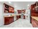 Lovely kitchen with granite countertops, stainless appliances, and tiled floors at 1723 Stonehenge Dr, Lafayette, CO 80026