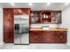 Large kitchen with stainless steel appliances, ample cabinetry, and granite countertops at 1723 Stonehenge Dr, Lafayette, CO 80026