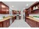 Gourmet kitchen featuring stainless steel appliances and granite countertops at 1723 Stonehenge Dr, Lafayette, CO 80026