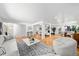 Open living room offers modern furnishings and great natural light at 1723 Stonehenge Dr, Lafayette, CO 80026