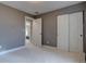 Bedroom featuring neutral walls and plush carpet at 7249 S Iris Ct, Littleton, CO 80128