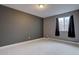 Bedroom boasting neutral colors and window at 7249 S Iris Ct, Littleton, CO 80128