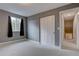 Bedroom showcasing neutral colors, carpet and window at 7249 S Iris Ct, Littleton, CO 80128