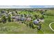 An aerial view of a neighborhood and surrounding park at 11335 W 54Th Ln, Arvada, CO 80002