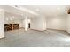 Large basement with bright recessed lighting and kitchenette for added entertaining at 11335 W 54Th Ln, Arvada, CO 80002