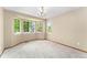 Dining room boasts a large bay window, allowing for plenty of natural light at 11335 W 54Th Ln, Arvada, CO 80002