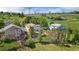 This home boasts a large backyard with a deck, pergola, and mature trees at 11335 W 54Th Ln, Arvada, CO 80002