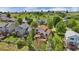 A beautiful aerial view of the back of the home, showcasing a large yard with a gazebo and a deck at 11335 W 54Th Ln, Arvada, CO 80002