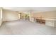 Open loft area overlooking staircase with neutral carpet throughout at 11335 W 54Th Ln, Arvada, CO 80002