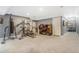 Basement featuring exercise equipment, arcade games, and plush carpeting at 16160 E 119Th Ave, Commerce City, CO 80022