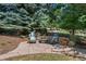 Flagstone patio with fire pit and comfortable seating at 39 Golden Eagle Ln, Littleton, CO 80127