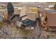 Aerial view of house showing the backyard deck, landscaping, roof and neighborhood at 1769 W 113Th Ave, Denver, CO 80234