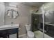 Beautifully remodeled bathroom with a modern vanity, stylish mirror, and tiled shower with glass door at 1769 W 113Th Ave, Denver, CO 80234