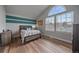 Inviting bedroom with arched window, natural light, and modern decor at 1769 W 113Th Ave, Denver, CO 80234