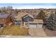 Aerial view of a well maintained home with multiple car garage and mature trees at 1769 W 113Th Ave, Denver, CO 80234