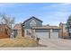 Charming two-story home with a well-manicured lawn and an attached two-car garage at 1769 W 113Th Ave, Denver, CO 80234