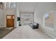 A brightly lit living room with high ceilings and a large bay window at 1769 W 113Th Ave, Denver, CO 80234