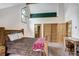 Bedroom with a pitched ceiling, carpet, and ensuite bathroom and closet at 47 Forest Cir, Breckenridge, CO 80424