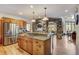 Gourmet kitchen with a large island, stone accents, and high-end stainless steel appliances at 47 Forest Cir, Breckenridge, CO 80424