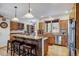 Bright kitchen with a breakfast bar, granite countertops, and stainless steel appliances at 47 Forest Cir, Breckenridge, CO 80424