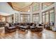Bright living room with vaulted ceilings, hardwood floors, large windows, and comfortable seating at 47 Forest Cir, Breckenridge, CO 80424