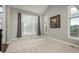 Bright Living Room with vaulted ceiling, carpet, and a view of the outdoors at 47032 Frasier Fir Cir, Parker, CO 80138