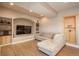 Inviting living room featuring a sectional sofa and a built-in entertainment center at 47032 Frasier Fir Cir, Parker, CO 80138