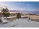 Patio with seating provides outdoor living and views of the expansive yard at 47032 Frasier Fir Cir, Parker, CO 80138