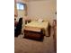 Bedroom featuring carpeted floors, a closet, and furniture at 11953 Us Highway 285, Conifer, CO 80433