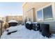 Small backyard with grills and covered AC unit at 1214 S Zeno Way # D, Aurora, CO 80017