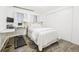 Bright bedroom with natural light and modern amenities provides a functional and comfortable living space at 677 Vrain St # 15, Denver, CO 80204