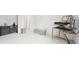Bedroom area with modern desk and dresser, offering space for work and relaxation at 677 Vrain St # 15, Denver, CO 80204