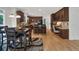 Beautiful kitchen with wooden cabinets, island, stainless steel appliances and desk nook at 10683 Amesbury Way, Highlands Ranch, CO 80126