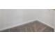 Corner of a walk-in closet with neutral colored carpet and white walls in the house at 2824 W Centennial Dr # L, Littleton, CO 80123