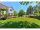 Wide backyard featuring lush lawn and wooden deck, perfect for outdoor enjoyment at 7858 Oban Ct, Lone Tree, CO 80124