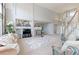 Comfortable living room showcasing a fireplace, built-in shelving, and an open floor plan at 7858 Oban Ct, Lone Tree, CO 80124