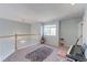 Open loft space featuring natural lighting and plenty of room for entertainment at 7858 Oban Ct, Lone Tree, CO 80124
