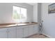 Functional mud room features built-in cabinets and countertop space at 7858 Oban Ct, Lone Tree, CO 80124
