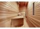 Inviting sauna features light wood and a basket of rolled white towels at 7858 Oban Ct, Lone Tree, CO 80124
