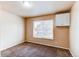 Inviting bedroom with large window and closet space at 261 Linda Ln, Denver, CO 80221