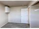 Neutral painted bedroom with closet, carpet flooring, and open door to hallway at 261 Linda Ln, Denver, CO 80221