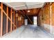 Unfinished garage, showcasing the open space and framework of the structure at 261 Linda Ln, Denver, CO 80221