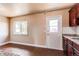 The kitchen includes a small pantry area with access to the outside at 261 Linda Ln, Denver, CO 80221
