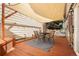 Outdoor patio with a shade cover over the outdoor dining table and chairs at 4713 Perth St, Denver, CO 80249