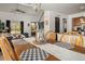 Open floorplan dining area with decorative table set up, visible front door and living room at 4713 Perth St, Denver, CO 80249