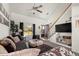 Bright and airy living room with comfortable seating, high ceilings, and an open flow to other areas at 4713 Perth St, Denver, CO 80249