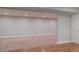Large basement area with carpet and hardwood flooring, recessed lights, and neutral paint at 1035 Quartz St, Golden, CO 80401