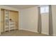 Bedroom with closet, blinds and carpeted floors at 1035 Quartz St, Golden, CO 80401