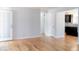 Bright and open living room with hardwood flooring and a doorway to kitchen at 1035 Quartz St, Golden, CO 80401